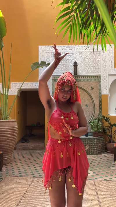 My bush is peeking out beneath my skirt 