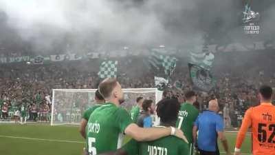 An amazing video that gives goosebumps, of Maccabi Haifa players celebrating with 35k fans at full time, after winning their first championship in a decade