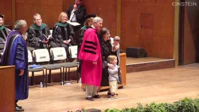 Toddler steals the show and gives away mom's M.D.