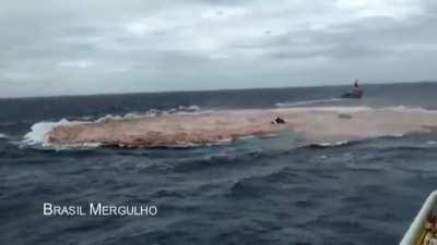 Giant carrying ship sinking
