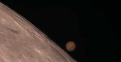 Mars reappearing from behind the Moon