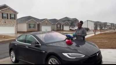 To gift their brat child a Tesla