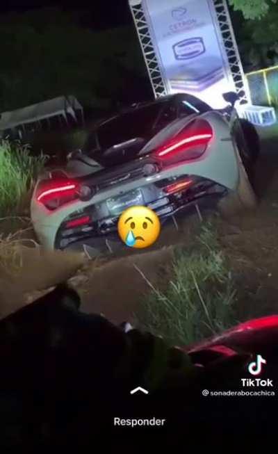 CARTEL driving Mclaren 720 down dirt/mud road