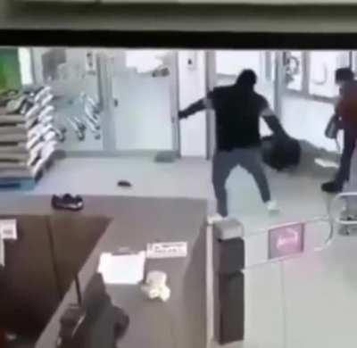 Man with excellent situational awareness hands his coffee to his wife before sending an attempted assailant into another dimension