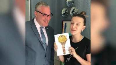 Mills helping to promote a book