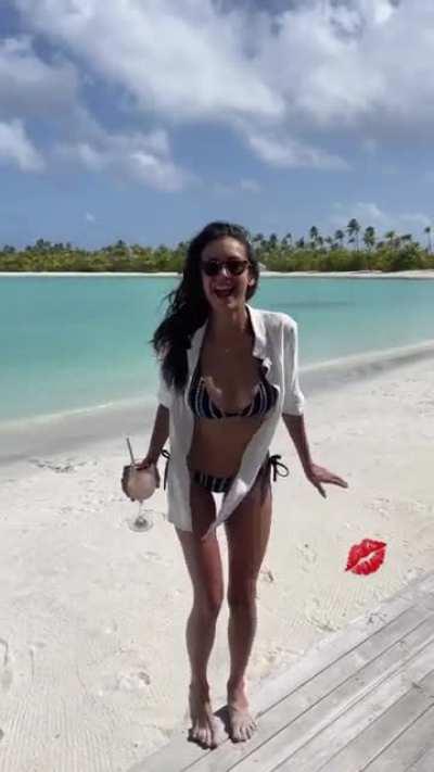 Maldives Nina jumping in bikini