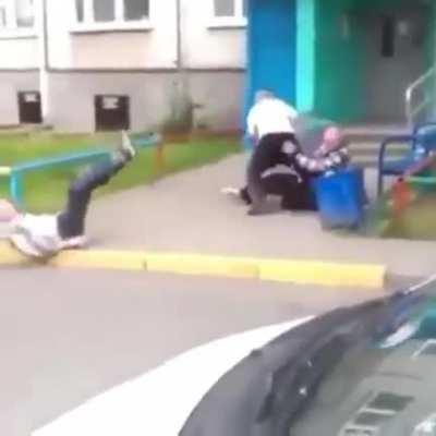 2 old man fighting and ohter old man trying to break up the fight