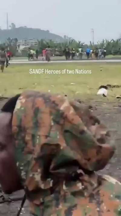 Civilians evacuated from Goma behind cover from South African forces DRC, 27 January 2025