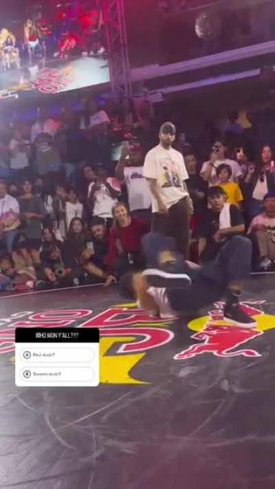 The guy performes a fortnight flip in a break dance comp