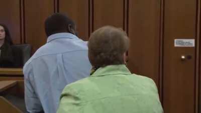 Father tackles his daughter's smirking killer in court