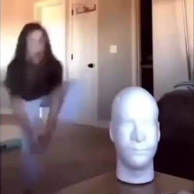 Girl vs. Still Head = Head wins