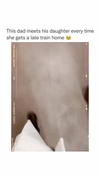 This dad waits for his daughter wheb she gets the late train home.