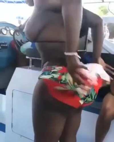 Gabby on a boat stripping down to her Bikini
