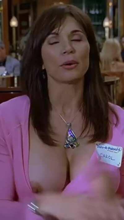 Kimberly Page's big titty pops out and her top gets caught on her hard nipple in 