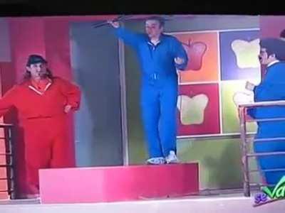 To safely zip line to the other side in a reality TV show with a live audience