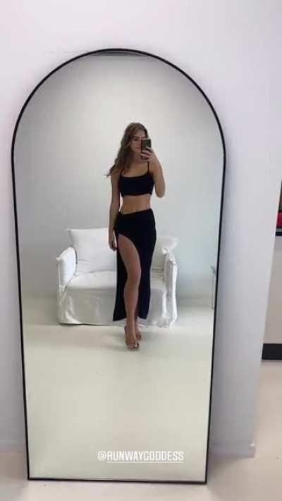 Em in her little black dress