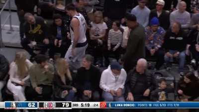 [Highlight] Luka Doncic tumbles over the courtside seats while trying to recover the ball.