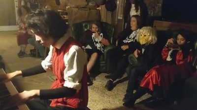 Playing the don't starve theme song, as Wilson, on halloween