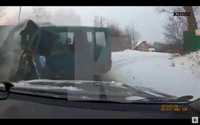 Russia: Green van hits a truck