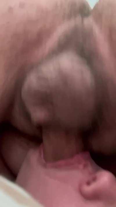 Balls deep in her throat.