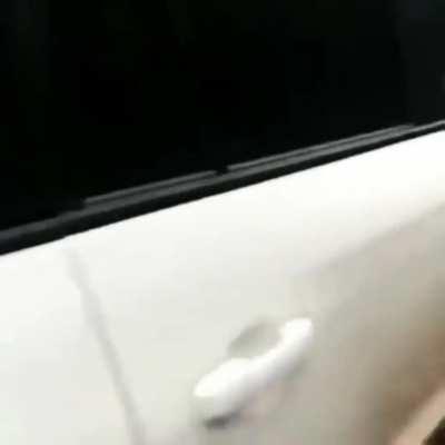 A car driving on a floating roadway