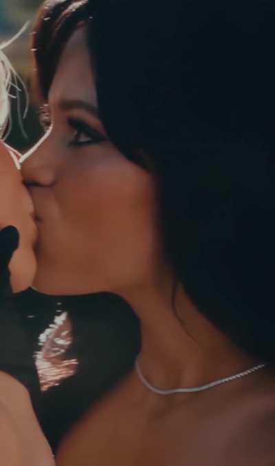 Jenna Ortega kissing Sabrina Carpenter in Sabrina's Music Video 