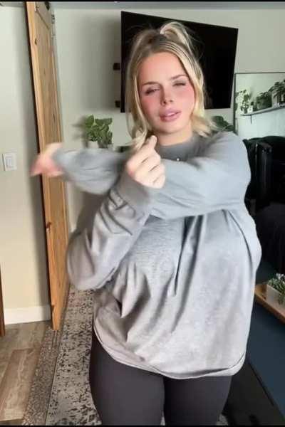 What she hiding under there?