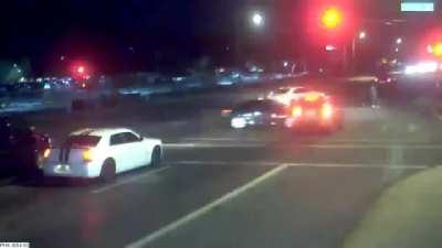 Car crash saves family crossing the street.