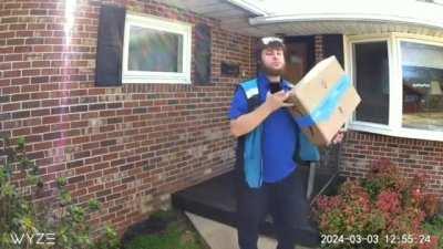 Amazon driver steals package right after delivering it.