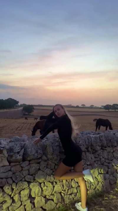 Polina Malinovskaya - Short Black Dress in a Windy Countryside Landscape (IG Story Clip)