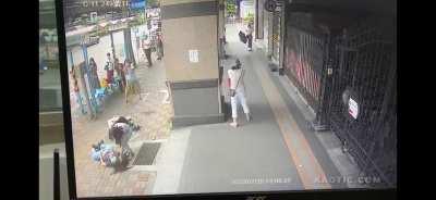 A woman walks to a bus stop. A window AC unit falls out of a window from the 17th floor. She never felt a thing.