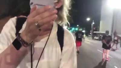 Journalists covering a protest are assaulted