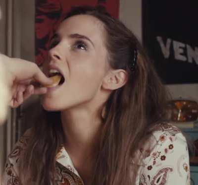 Emma Watson knows how important it is to keep eye contact when you put something in her mouth