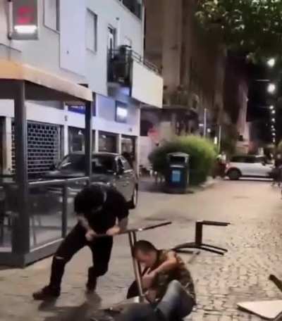 Naples, Italy. Man threatens diners with scissors until the waiter had enough