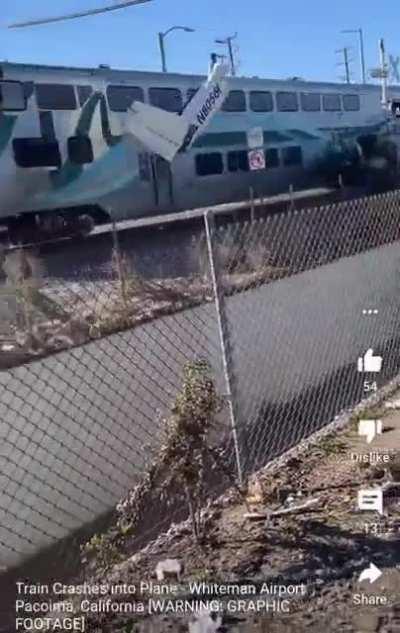 Recording a train hitting a crashed plane