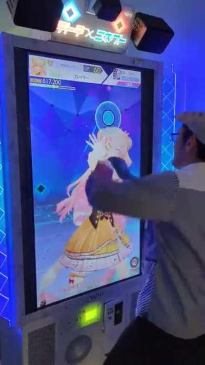 ZUN playing a rhythm game with Nenechi!