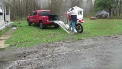Successfully loading a motorcycle into a truck bed