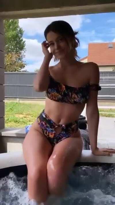 Her wet skin glowing