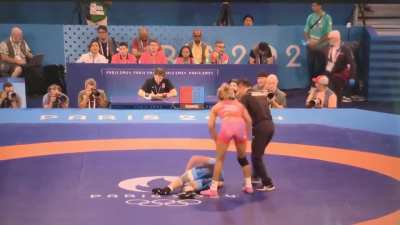 Female American wrestler Kennedy Blades slams opponent