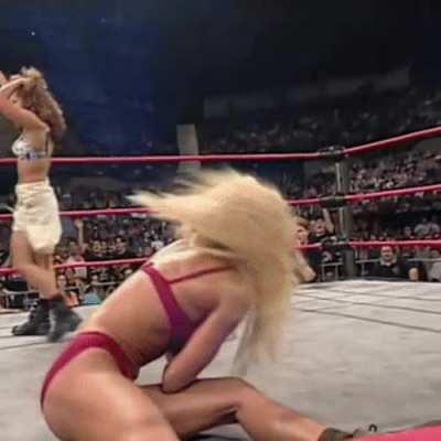 Tygress strips Torrie to her bra and panties on Nitro