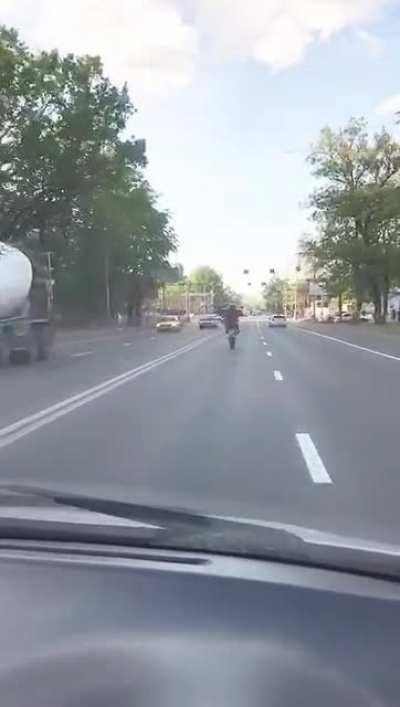 Doing stunts in traffic is NEVER a good idea