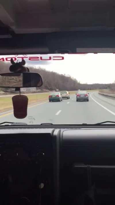 Guy tries t wreck other car, gets what is coming into him.