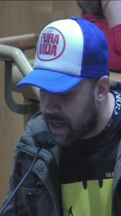 Attending a local government meeting.