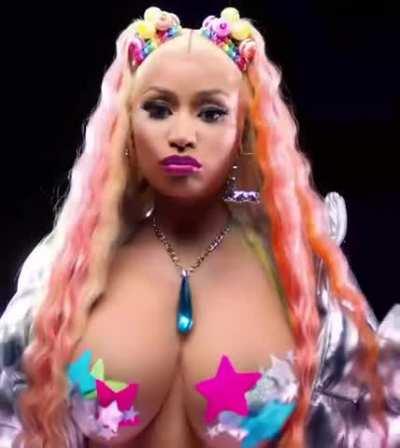 Nicki Minaj teasing her boobs