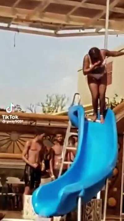 Well, the slide was same color as water. I guess it confused her.