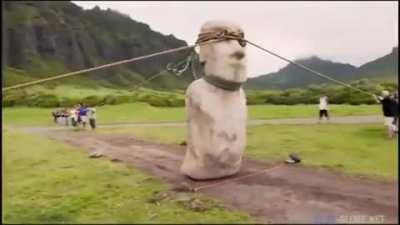 Looks like the statue is being restrained