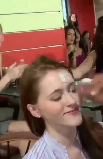 In front of her friends