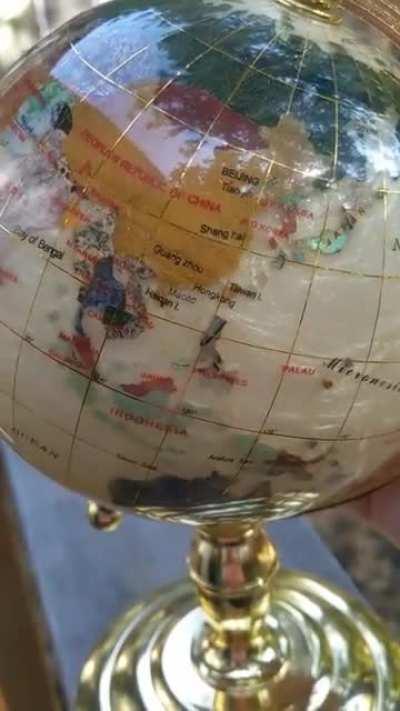 Just unboxed this world globe done in different minerals.