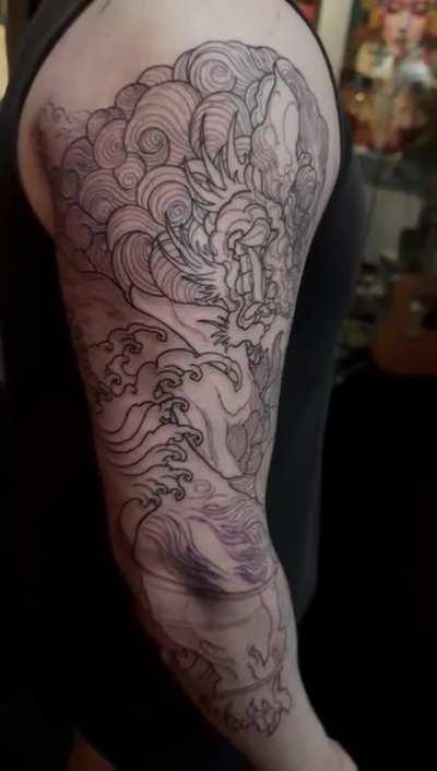 First outline session for my Fudog piece by @elvintattoo of Singapore 🇸🇬