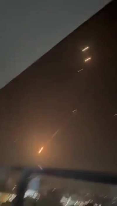 Guy films a ballistic missile exploding from his balcony